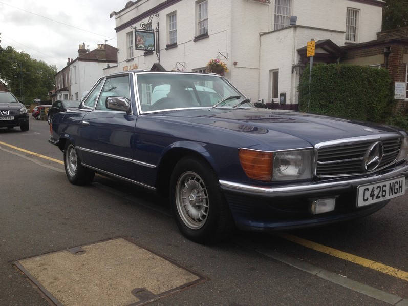 Classic Mercedes outside the workshop