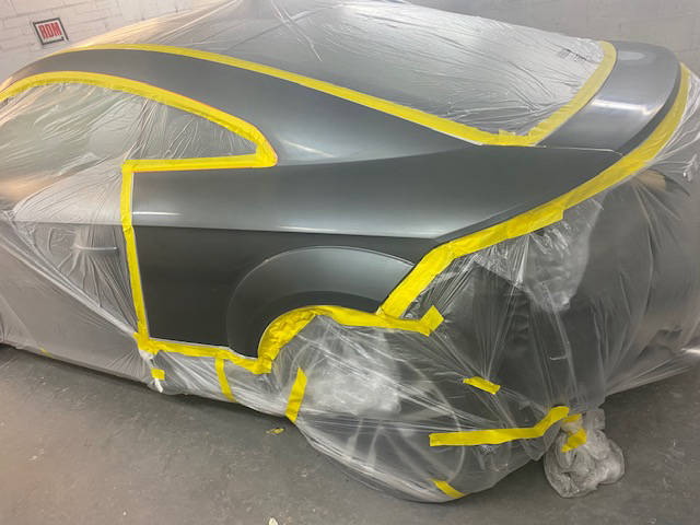 Audi carefully masked in preparation for paintwork